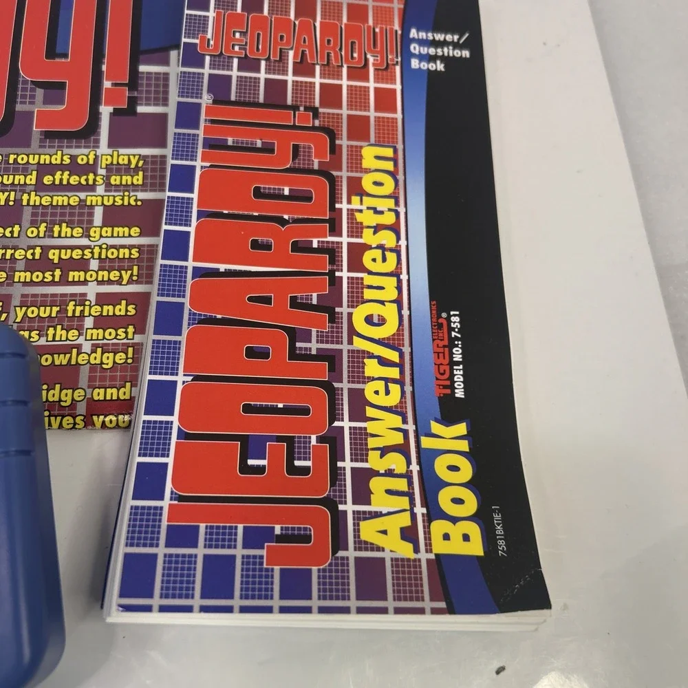 Tiger Electronics Jeopardy Hand Held Game 1995 with‎ Answer Book Tested Read